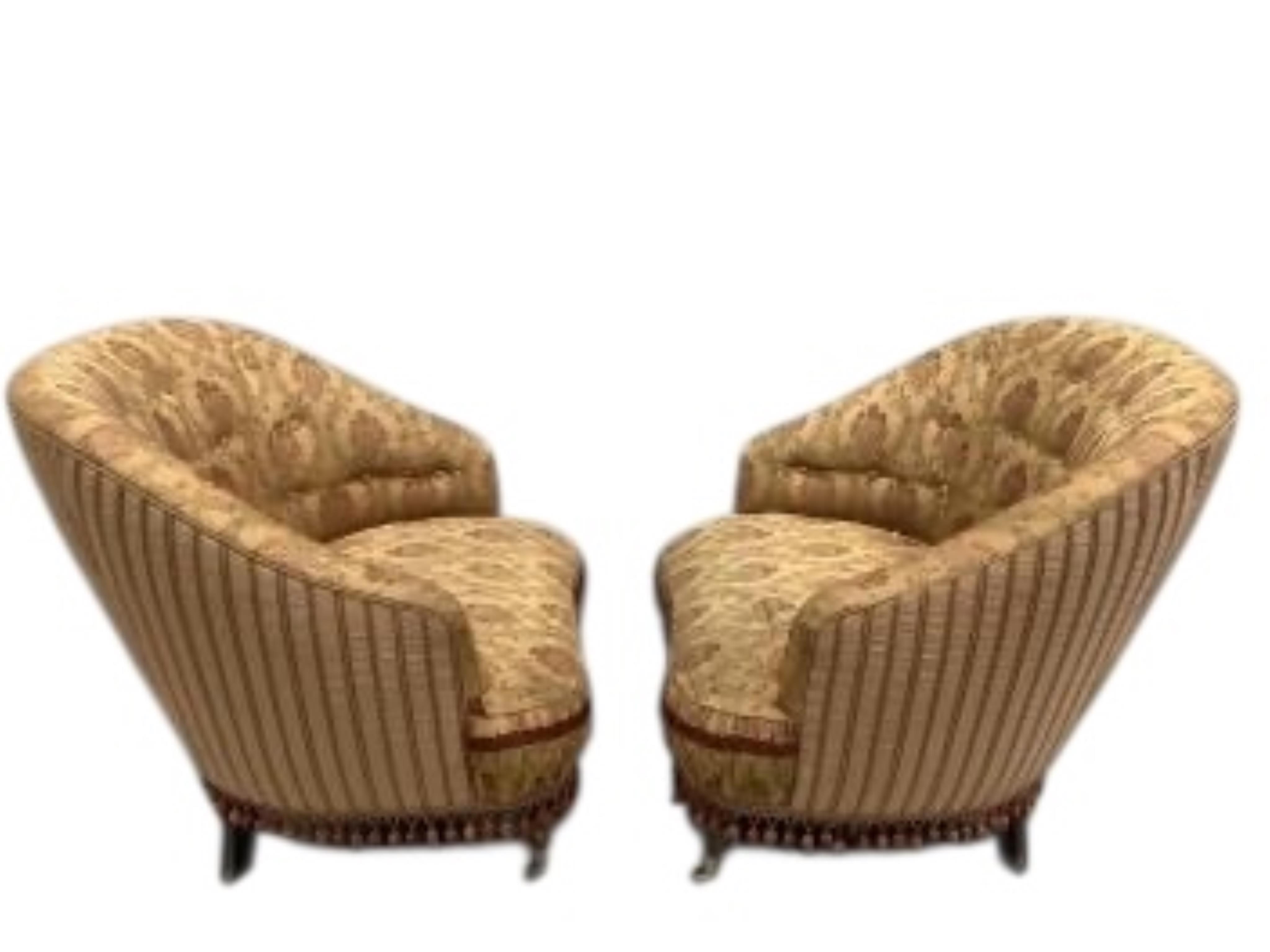 A pair of Provosi upholstered 'Tuffet' armchairs, width 94cm, depth 82cm, height 86cm